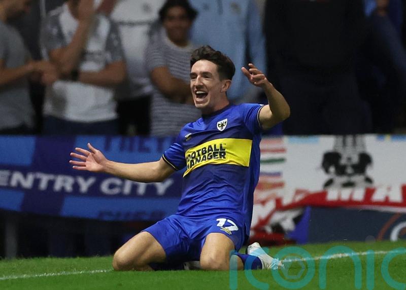 AFC Wimbledon stun Coventry with two late goals