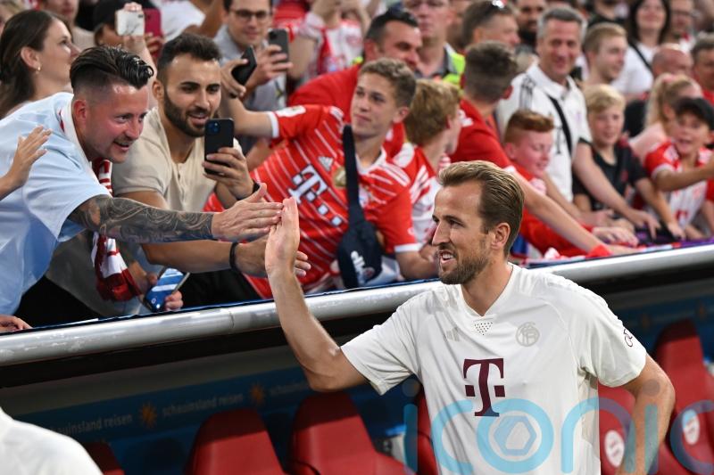 Harry Kane makes debut as Bayern Munich suffer defeat in German Super Cup