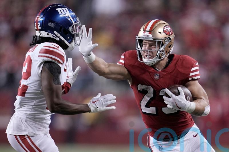 Christian McCaffrey equals record to keep San Francisco perfect