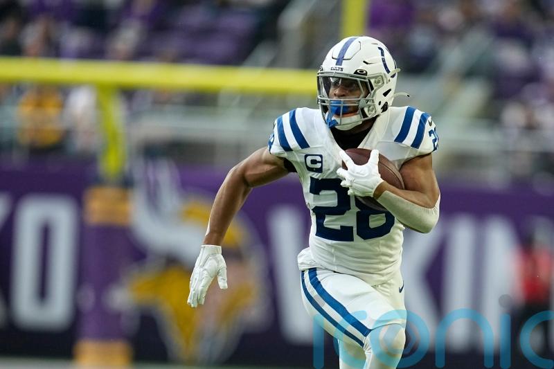 Jonathan Taylor ends speculation over his future by committing to the Colts