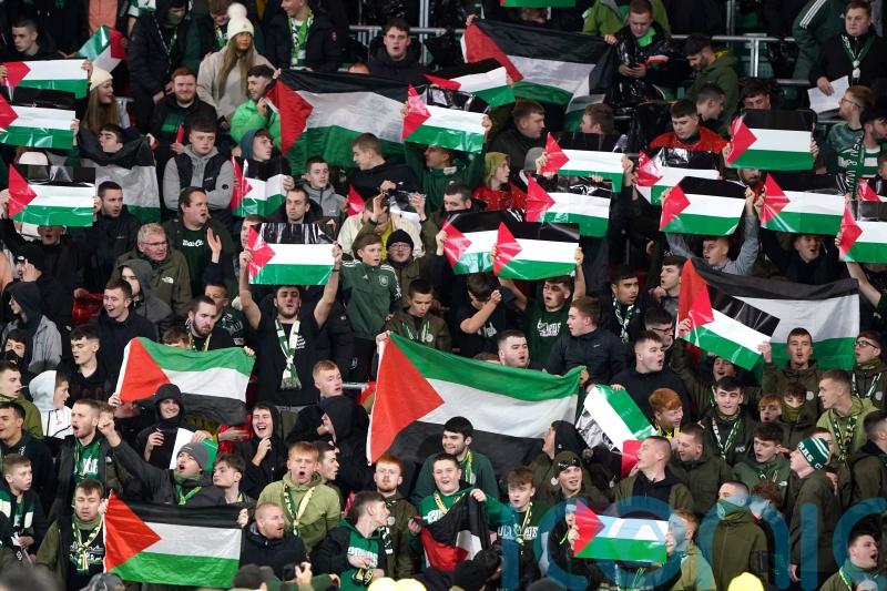 Celtic fans defy club and display Palestine flags at Atletico Madrid match