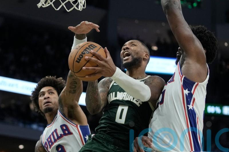 Damian Lillard scores 39 in Milwaukee Bucks&rsquo; 118-117 win over Philadelphia 76ers