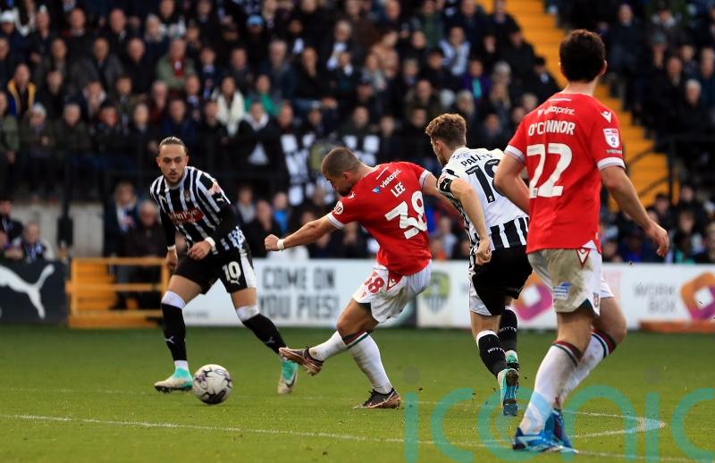 Wrexham wipe out gap to Notts County with late double