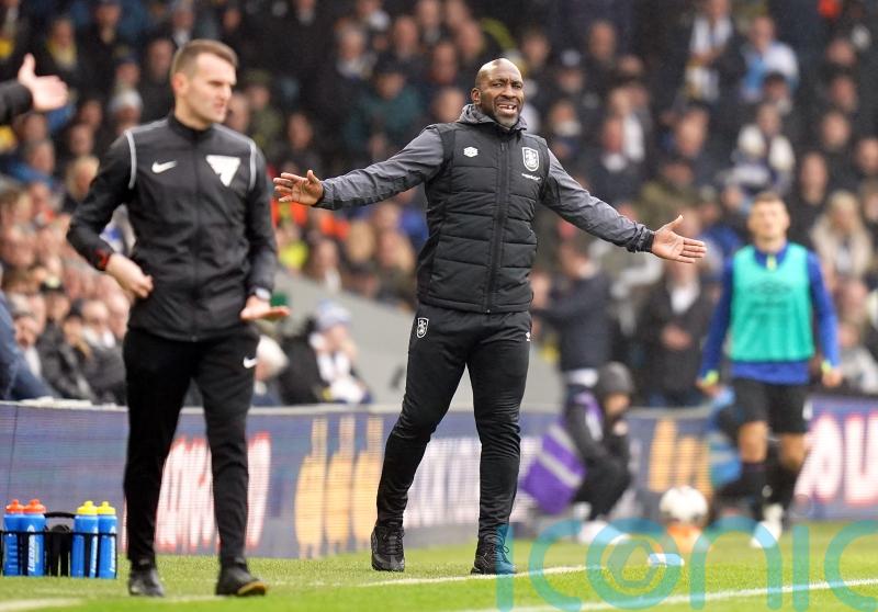 Darren Moore thanks the fans after Huddersfield battle to draw with Watford