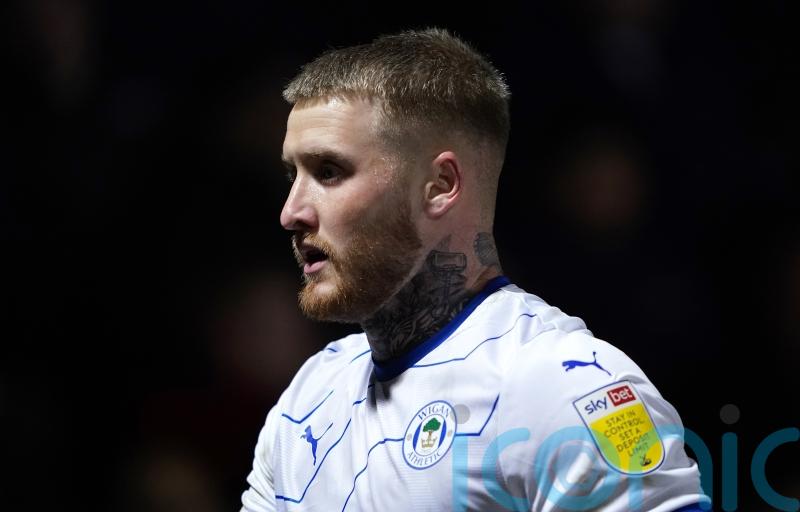 Wigan squeeze past plucky York in FA Cup second round