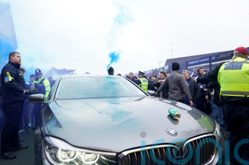 Car carrying Delia Smith hit with beer can as it arrives for football derby