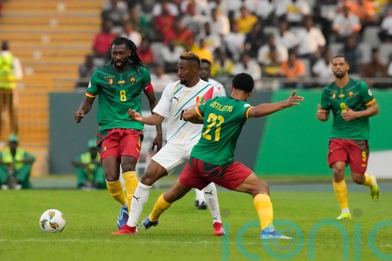 Cameroon held by 10-man Guinea in their Africa Cup of Nations opener