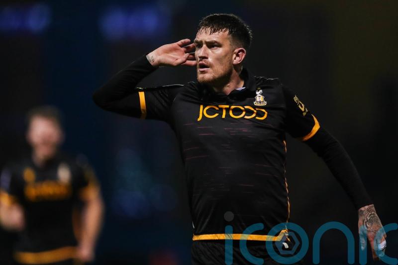 Wrexham suffer third straight league loss as Andy Cook snatches win for Bradford