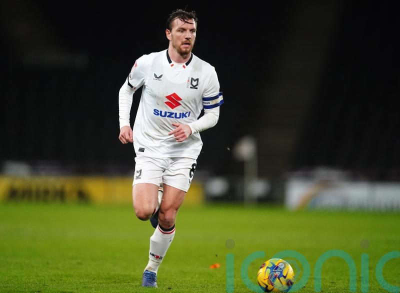 MK Dons boost promotion hopes with comeback win over Salford