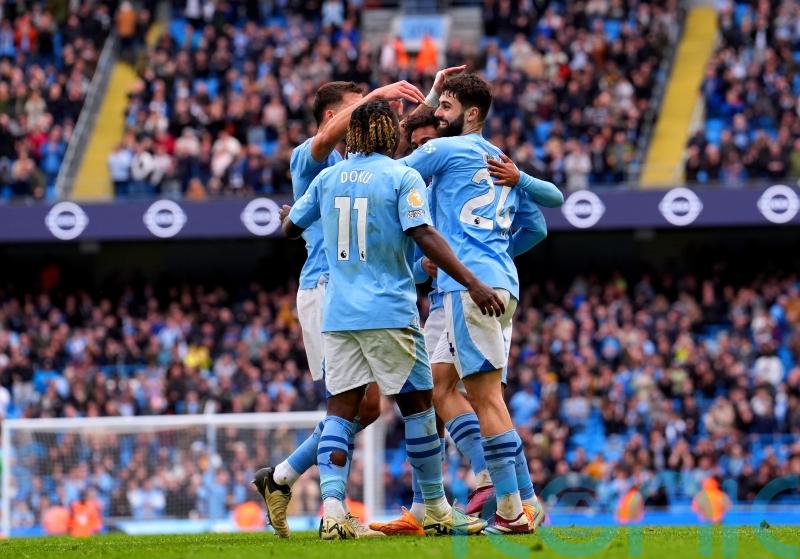 Five-star Manchester City blow away Luton to return to the Premier League summit