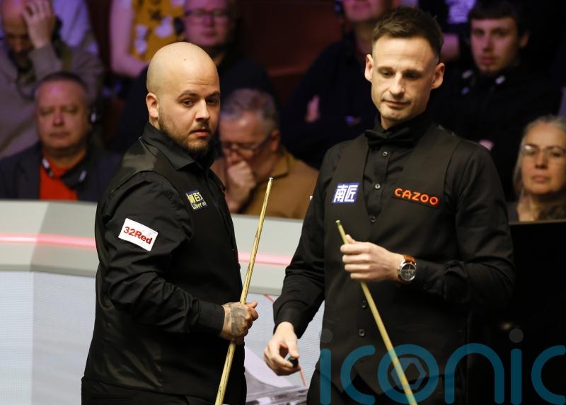 Luca Brecel finds form as World Championship title defence begins
