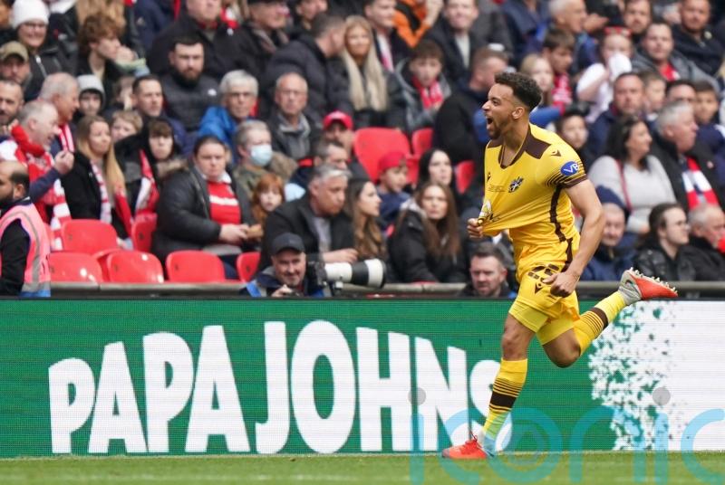 Grimsby clinch survival after home win over Swindon