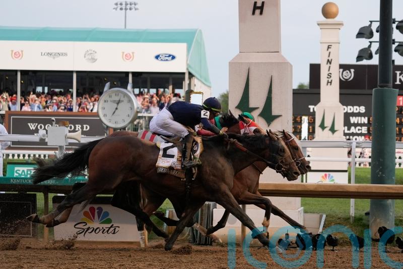 Mystik Dan clings on for victory in Kentucky Derby thriller