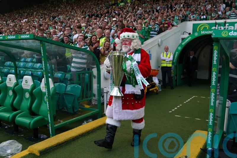 Santa Claus delivers Premiership trophy to Celtic in Parkhead sunshine