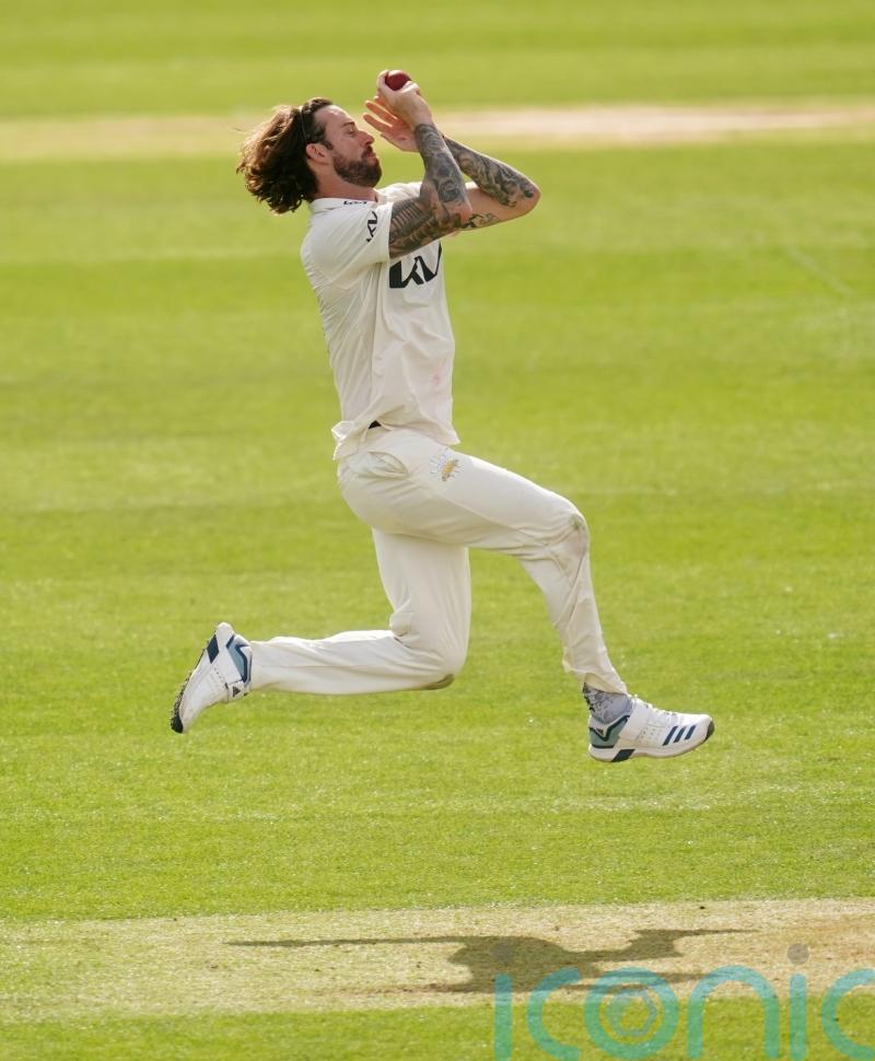 Surrey have the edge after 14 wickets fall on second day of top-of-table clash