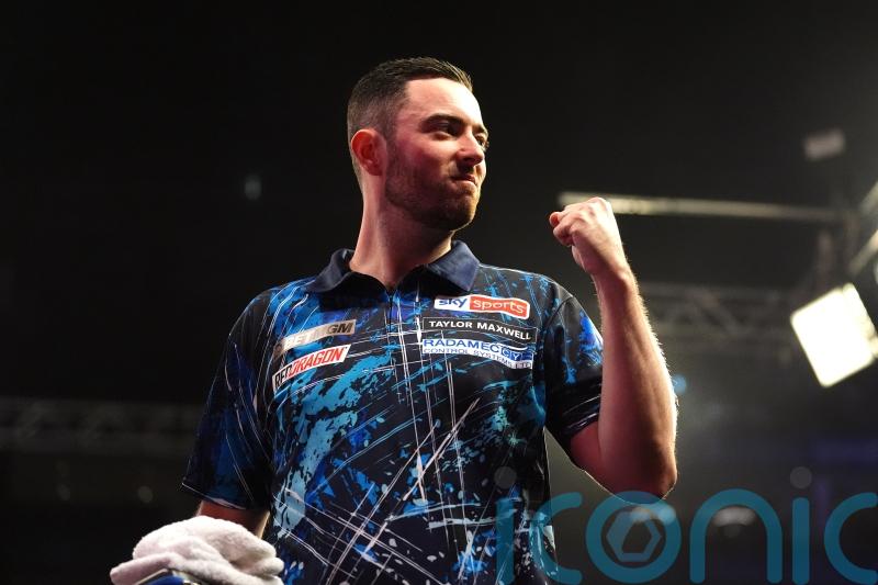 Luke Humphries battles past Dimitri Van den Bergh to reach Blackpool semis