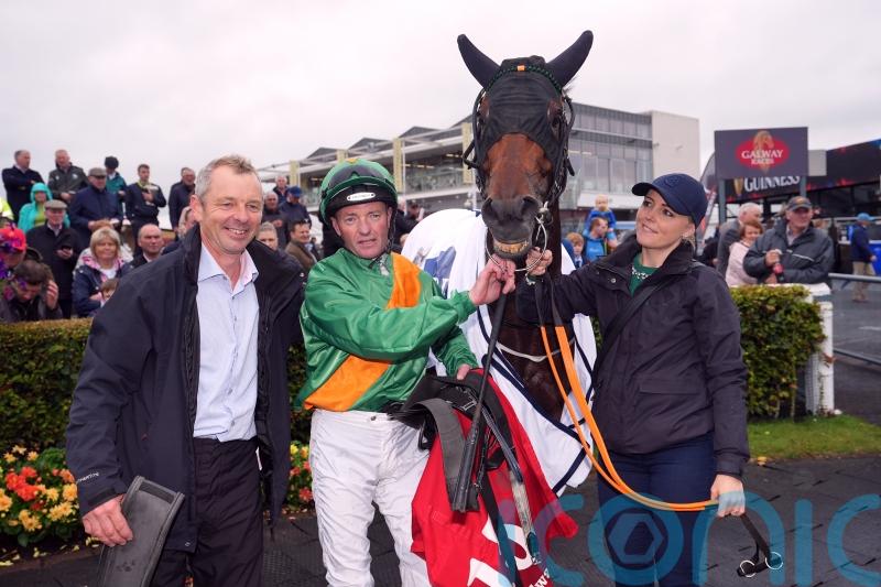 Micky Fenton celebrating with big handicap winner at Galway