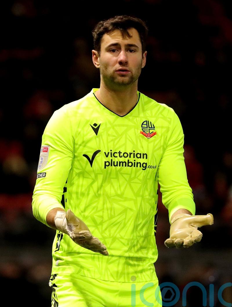 Nathan Baxter and Arthur Okonkwo keep clean sheets as Wrexham and Bolton draw