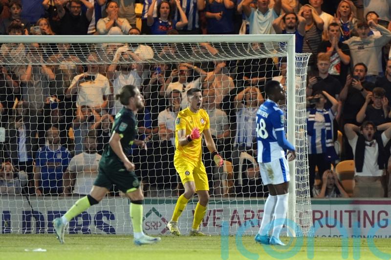 Hakon Valdimarsson saves late penalty as Brentford battle past Colchester