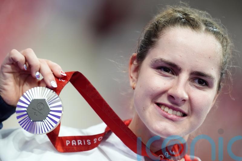 Daphne Schrager tells of &lsquo;surreal&rsquo; moment Jackie Chan presented her silver medal