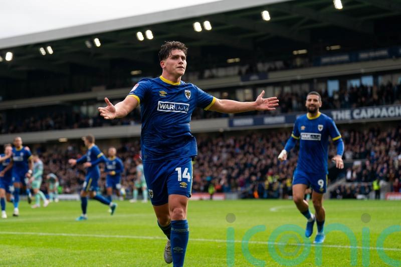 AFC Wimbledon continue dominance over MK Dons to reach FA Cup second round