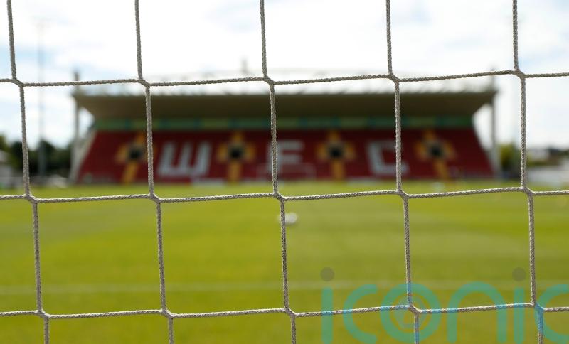 Woking move clear of relegation zone with win against Boston