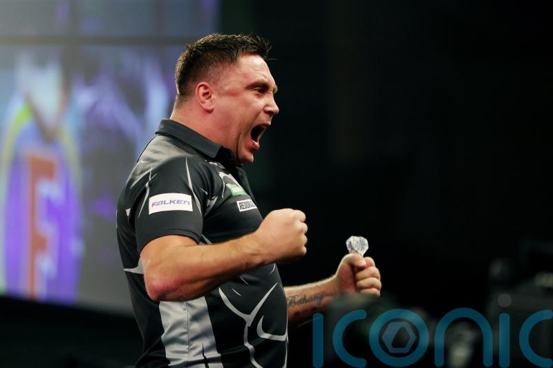Gerwyn Price eases past Keane Barry to reach third round at Alexandra Palace