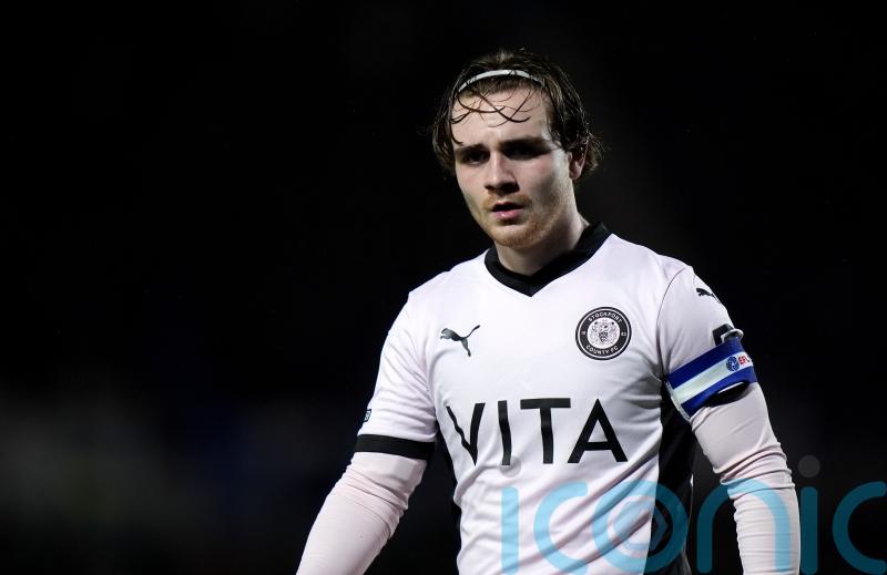 Huddersfield claim victory over Stockport thanks to early Lewis Bate own goal