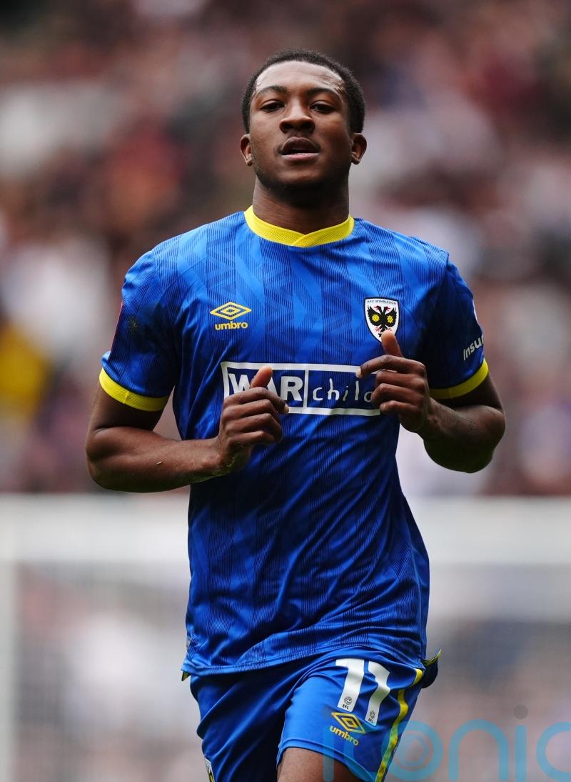 Josh Neufville&rsquo;s sublime strike helps keep promotion-chasing Wimbledon on track