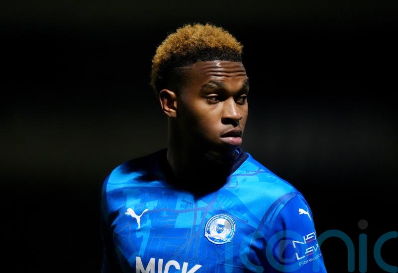 Promotion-chasing Wycombe rescue late point at Peterborough