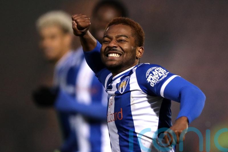 Colchester climb into League Two play-off places after five straight wins