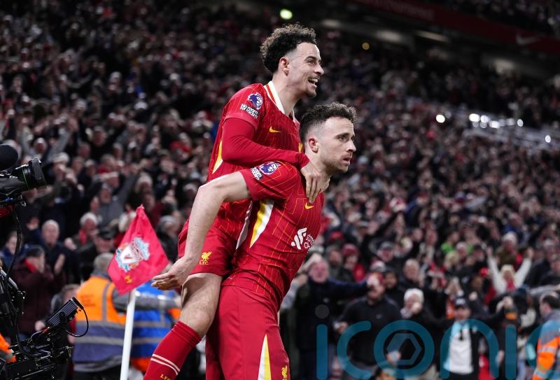 Diogo Jota fires leaders Liverpool to victory in controversial Merseyside derby