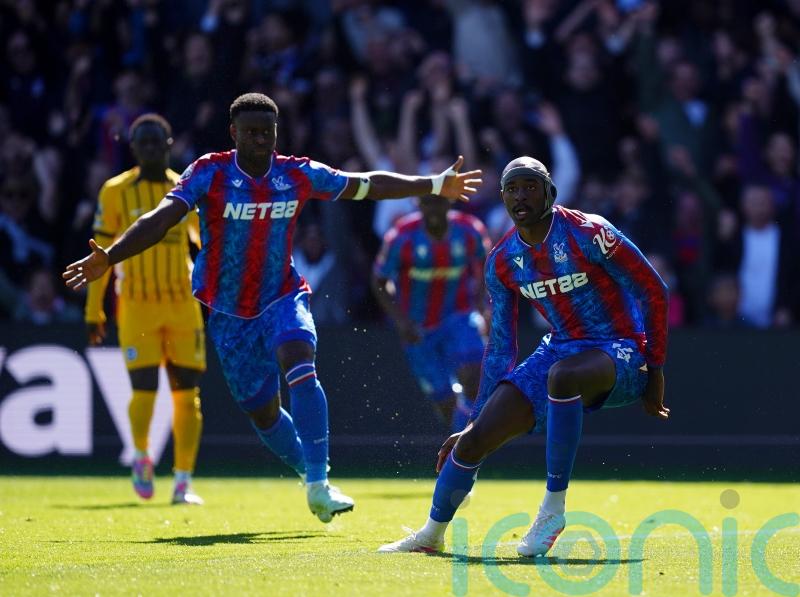 Nine-man Crystal Palace cling on to beat Brighton