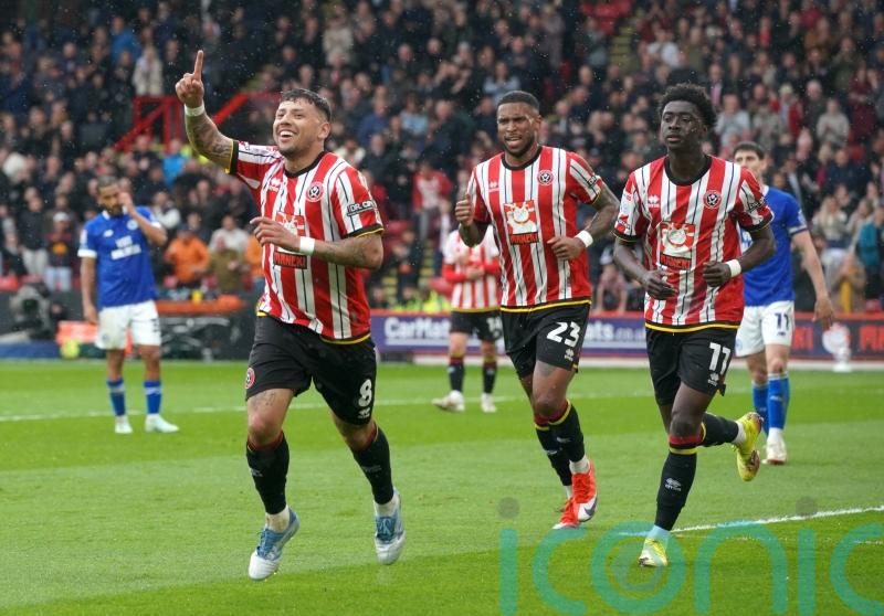 Blades cut gap to automatic promotion places with victory over lowly Cardiff