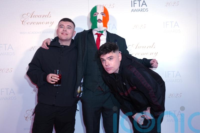 &lsquo;They are trying to silence us,&rsquo; Kneecap member facing terror charge tells crowd