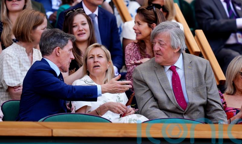 Sir Stephen Fry and Ellie Goulding lead famous faces in Wimbledon Royal Box