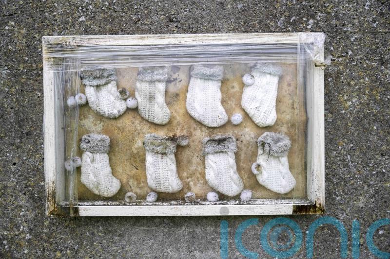 Major excavation of unmarked grave of babies and young children under way