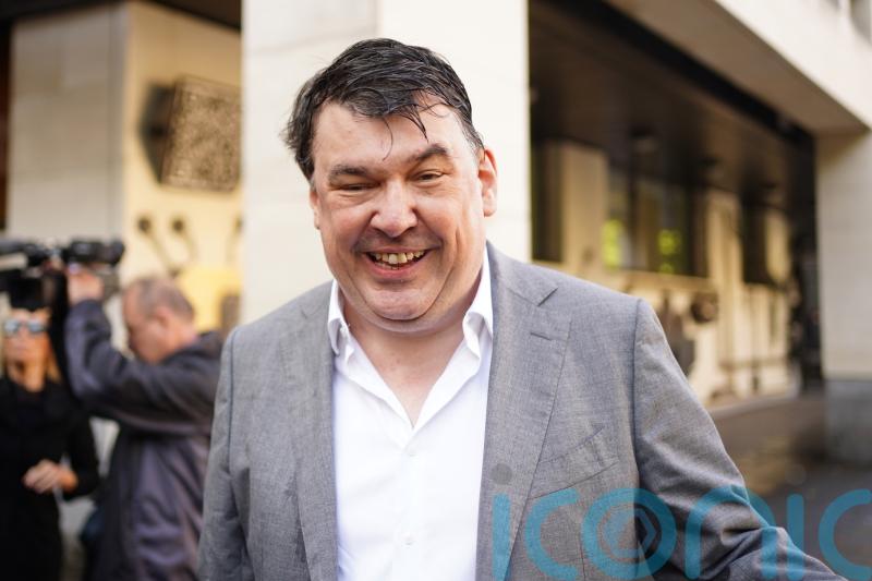 Father Ted creator Linehan arrives at court for trans activist harassment trial