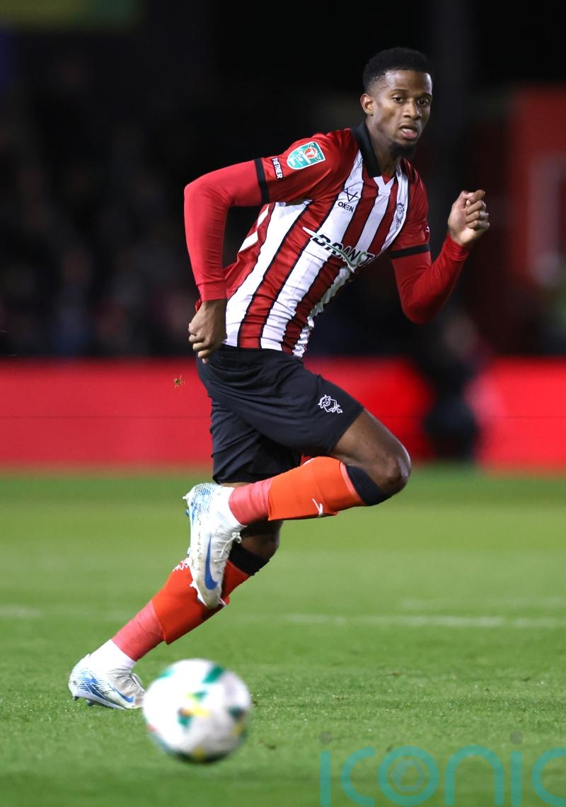 High-flying Lincoln ease past struggling Peterborough