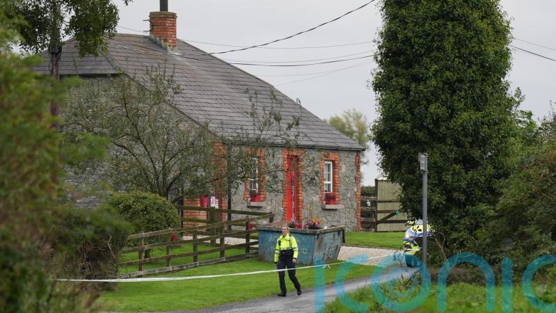 Man due in court charged over deaths of couple and their son