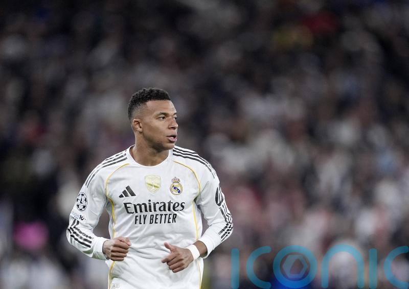 Kylian Mbappe nets hat-trick as Real Madrid win thriller against Olympiacos