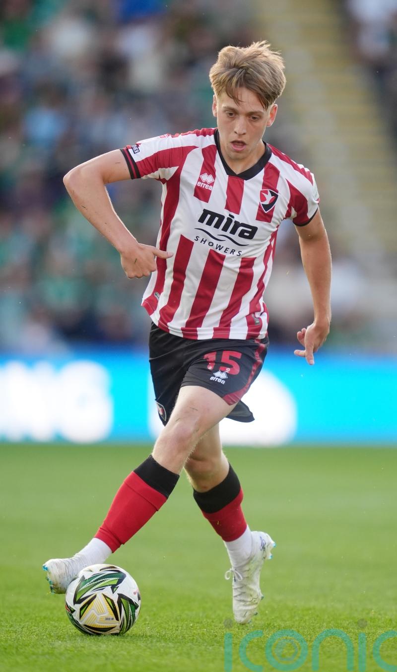 Cheltenham come from behind to beat Buxton and reach FA Cup third round