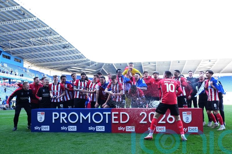 Lincoln secure promotion to Championship after last-gasp victory at Reading